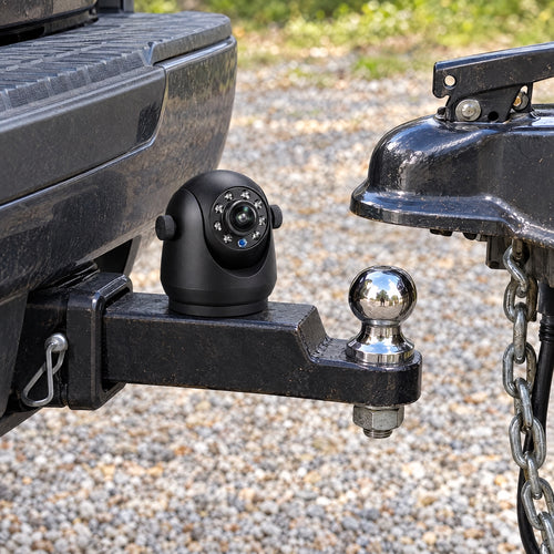 OneShot Hitch camera on a truck's ball mount, trailer coupler above the ball